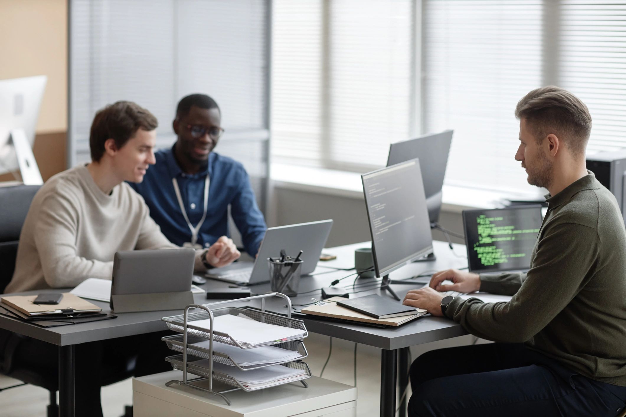 IT support team working together in a modern office